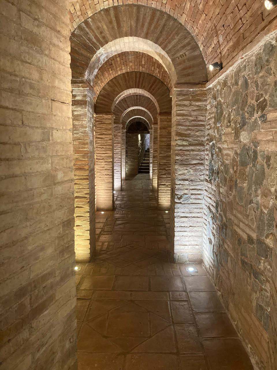 Vaulted brick cellar corridor